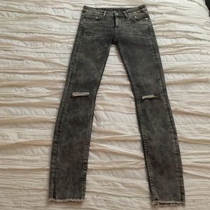 Grey distressed denim