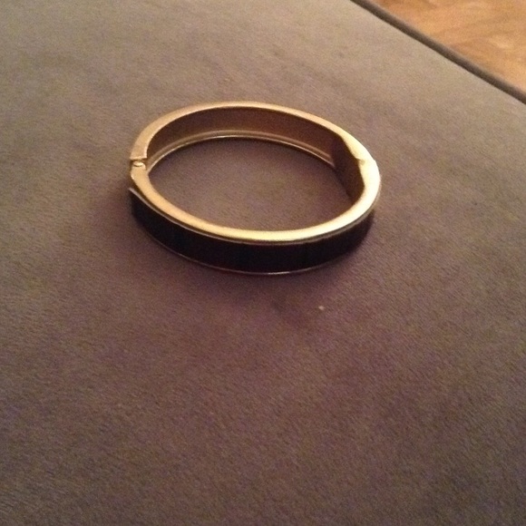 Gold and leather bangle