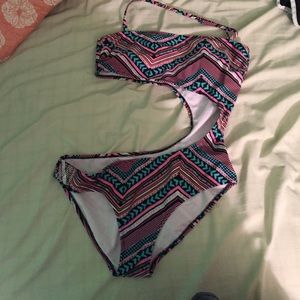 Swimbay one piece with open side