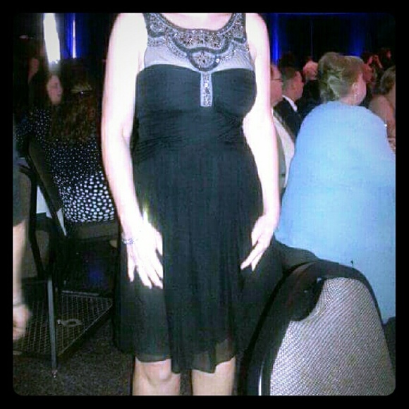 A beautiful BCBG Maxazria black dress