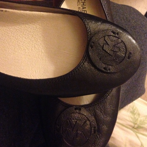 Michael Kors black flats.