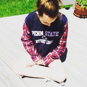 penn state sweatshirt with flannel sleeves.