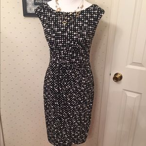 Black and cream color knee length dress