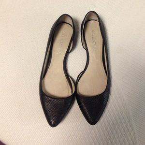Black flats with a snake skin pattern from Aldo