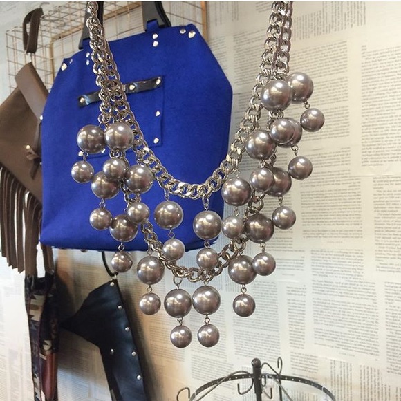 Silver/grey pearl drop down necklace