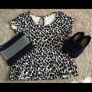 Torrid animal print peplum top with keyhole back