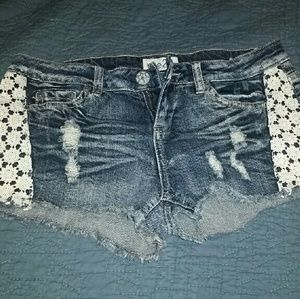 Distressed Jean short with lace trim