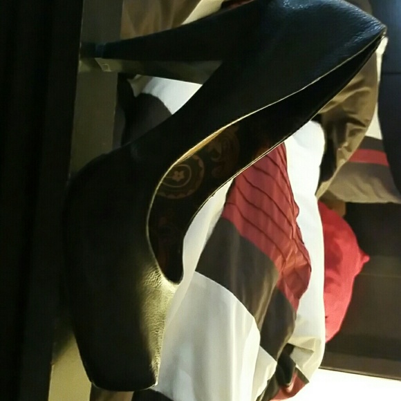 Black leather high heels