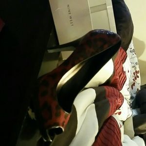 Red and brown Nine West peep toe heels.