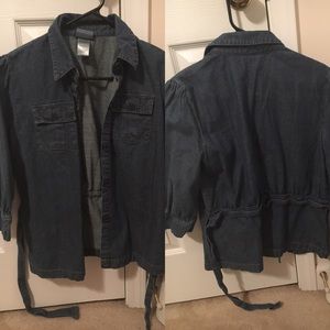 Classic denim outerwear jacket with attached belt.