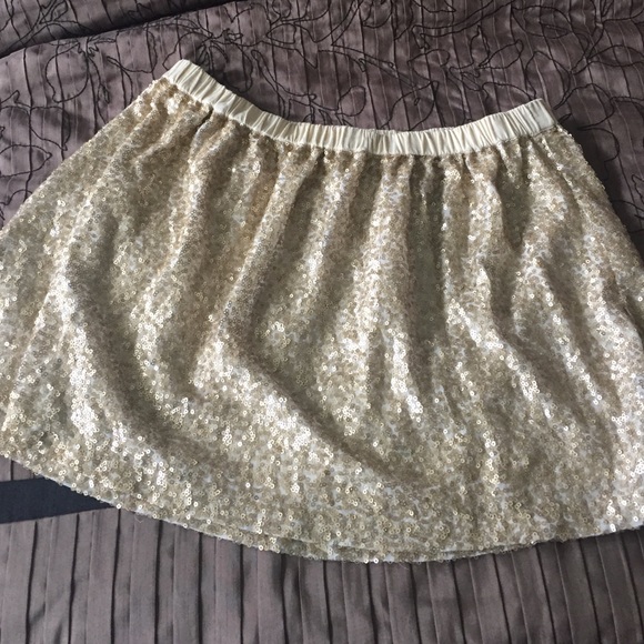 Sequined gold mini skirt