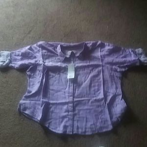 It's a button up Riders lees top never been worn