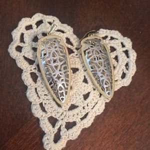 Kendra Scott two toned "Sadie Spear" earrings.