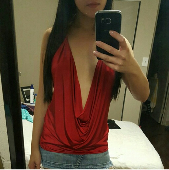 Vampy red top with deep V neckline and backless.