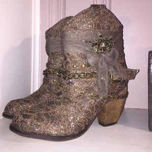Buckle embellished booties