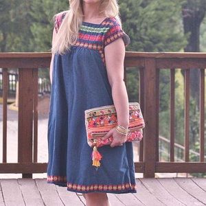 Denim swing dress with adorable neon stitching