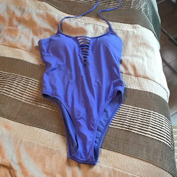 Strappy blue one piece bathing suit/body suit