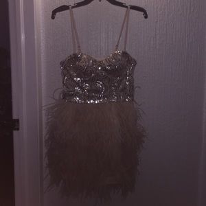 BEBE sequin and feather dress.