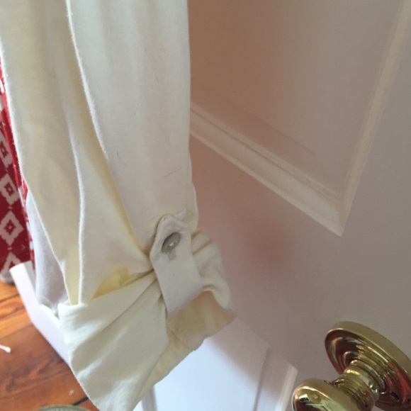 Red and white patterned top with blue trim. - Picture 3 of 3