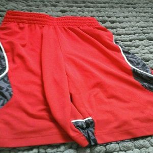 Red and black Adidas basketball shorts