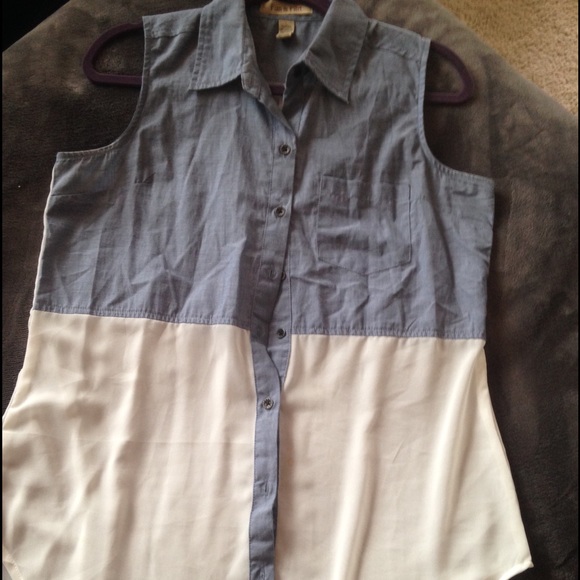 Denim and white flowy top.