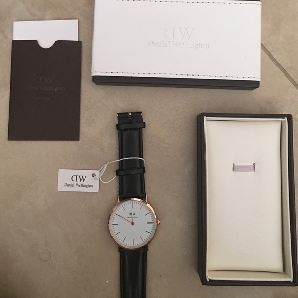 Black and gold Daniel Wellington watch