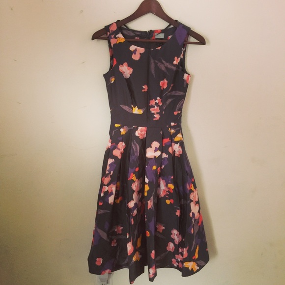 Brand new flower print tea length A line dress.