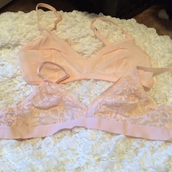 2 light pink bralettes