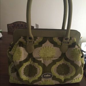 Petunia pickle bottom cake Cosmo carryall