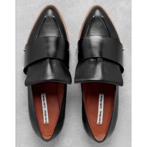 Classic black pointed toe loafers. Barely worn