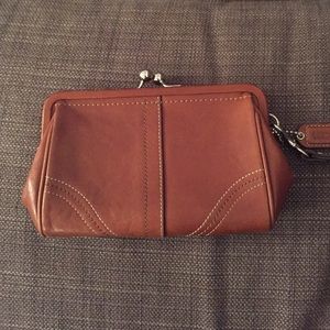 Brown coach leather clutch