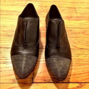 Black Dolce Vita loafers with metallic detail