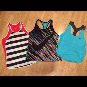 Bundle of three new Nike tank tops