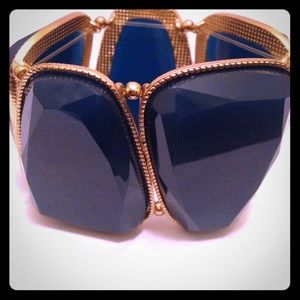 Blue stretch bracelet with gold trim