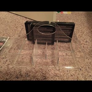 Clear, slotted make up tray