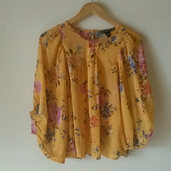 Yellow , floral shirt