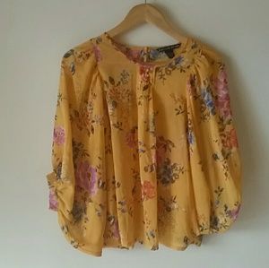 Yellow , floral shirt