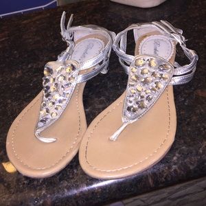 Silver studded sandals.