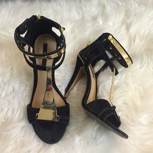 Black and gold heels
