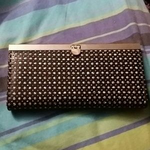 Black with silver hardware and specks.