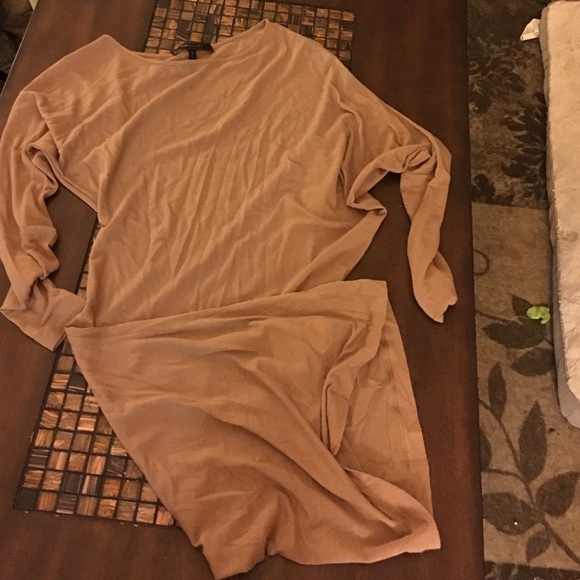 Fitted on the bottom, dolman sleeve on top