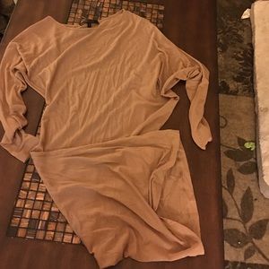 Fitted on the bottom, dolman sleeve on top