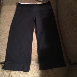 Lulu lemon black crop pants white waistband detail