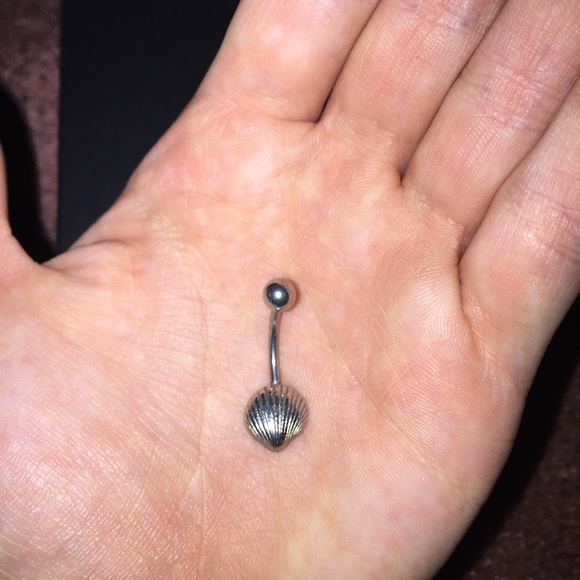 Sea shell belly button ring.