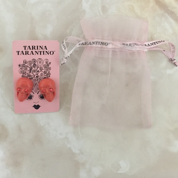 Tarina Tarantino pink skull earrings.