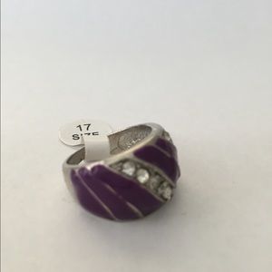 NEW. Purple and silver rhinestones ring.