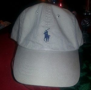 Tan and navy adjustable Polo hat.