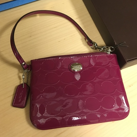 Cranberry COACH wristlet
