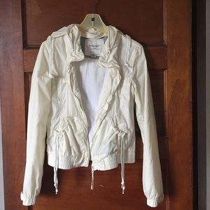 White rain/wind jacket. Size M