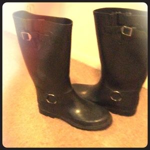 Black rubber high rain boots